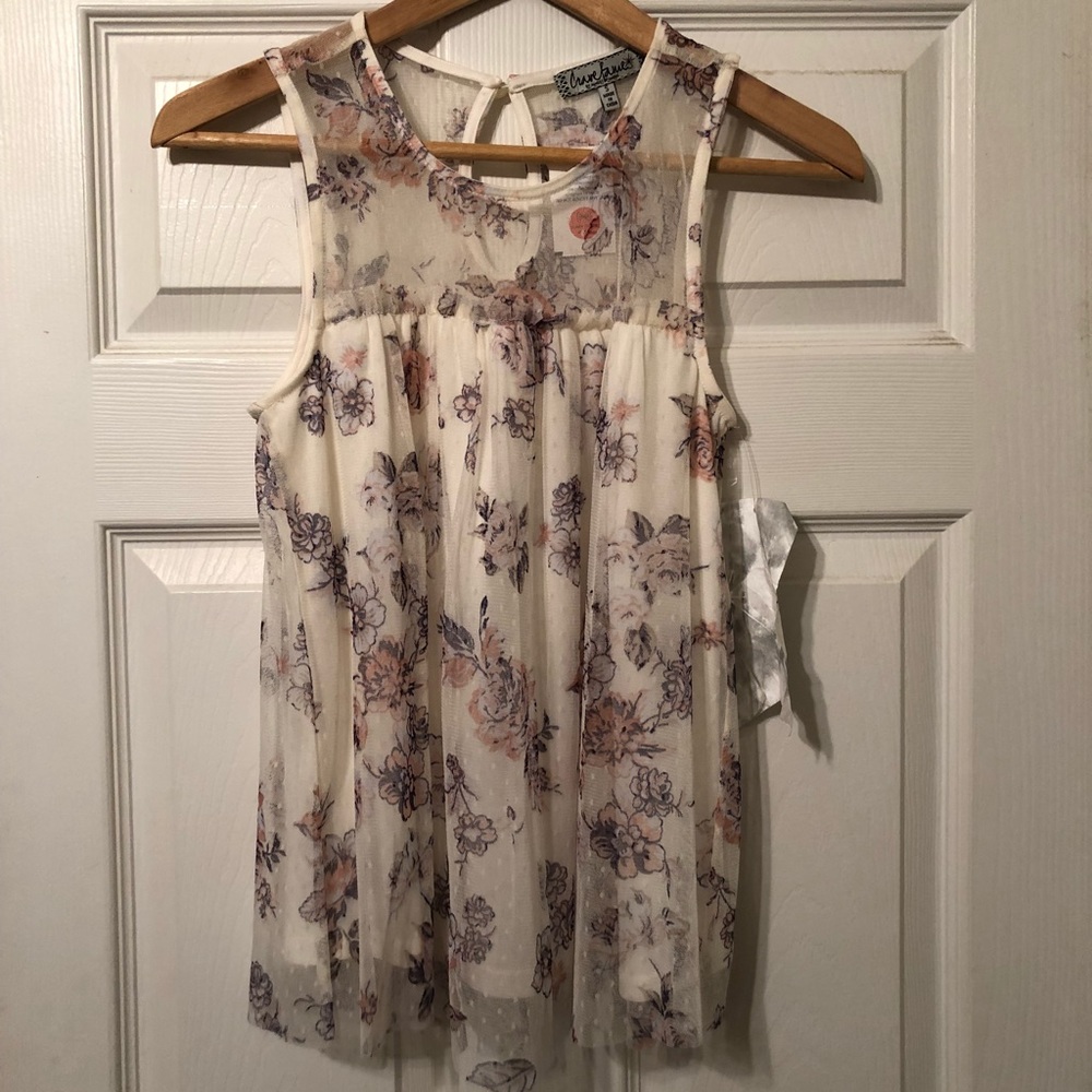 Cute flirty sleeveless blouse